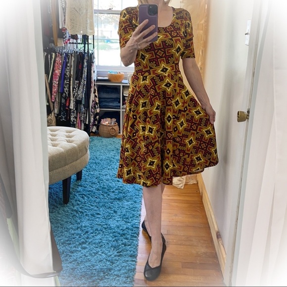 💕NWT Lularoe Nicole Dress Mustard Colored with Fun Star patterns💕 - Picture 1 of 12